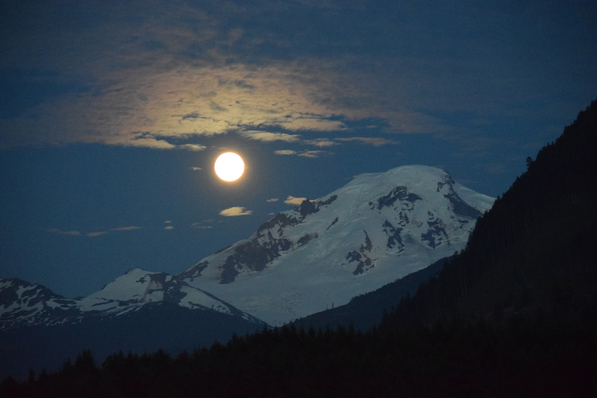 Moon is up on Glacier Suites